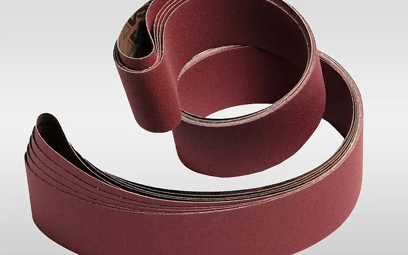 Several long closed sanding belts as a possible design
