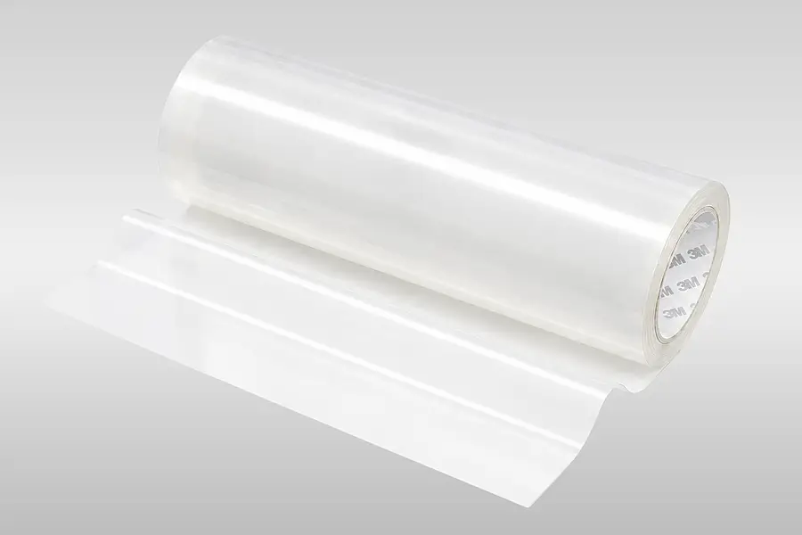 Red roll of 3M transfer tape with tape unwound