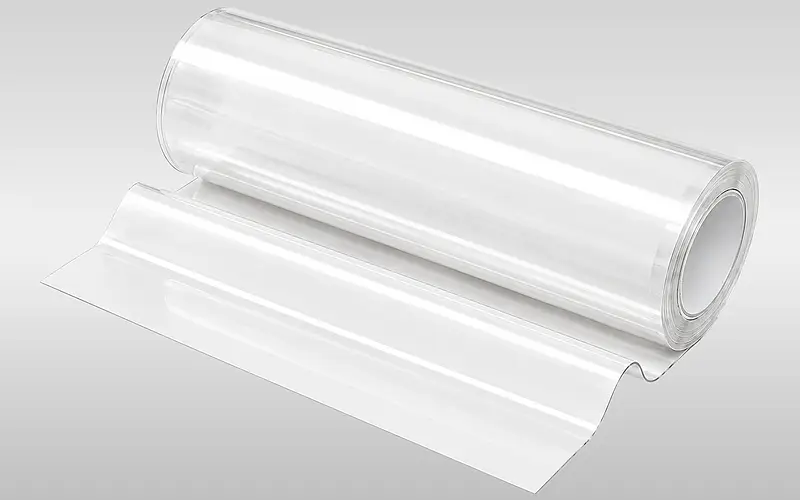 Transparent film web on a roll as an example of possible source material