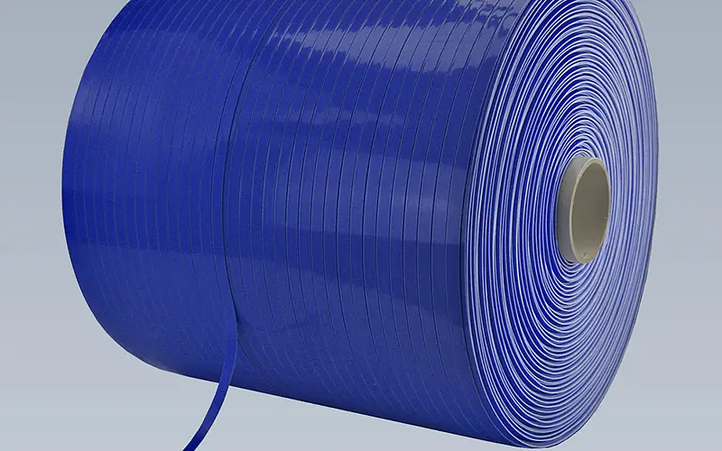 Finished blue cross-wound spool with a narrow tape end unwound