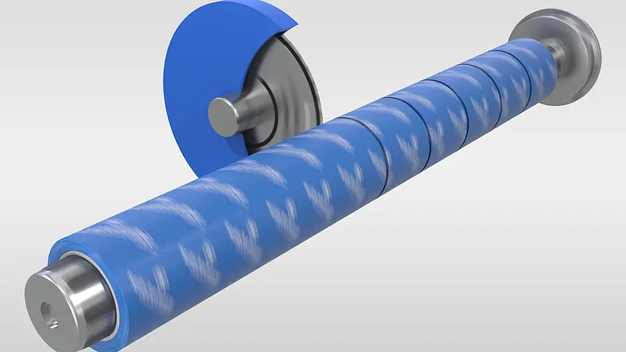 Circular blade divides a blue material roll into narrow strips