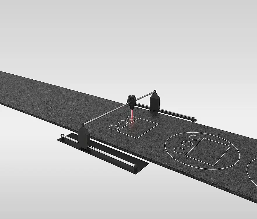 Illustration of a laser cutting contours from a dark foam sheet