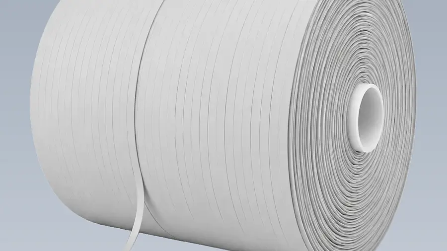 Large white cross-wound spool with a narrow tape end and small core