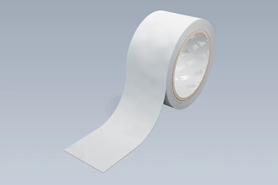 White adhesive tape roll with a loose strip as an example of roll material