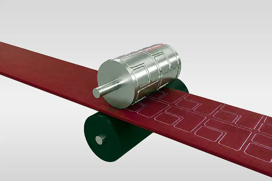 Illustration of a rotary die above a red material web