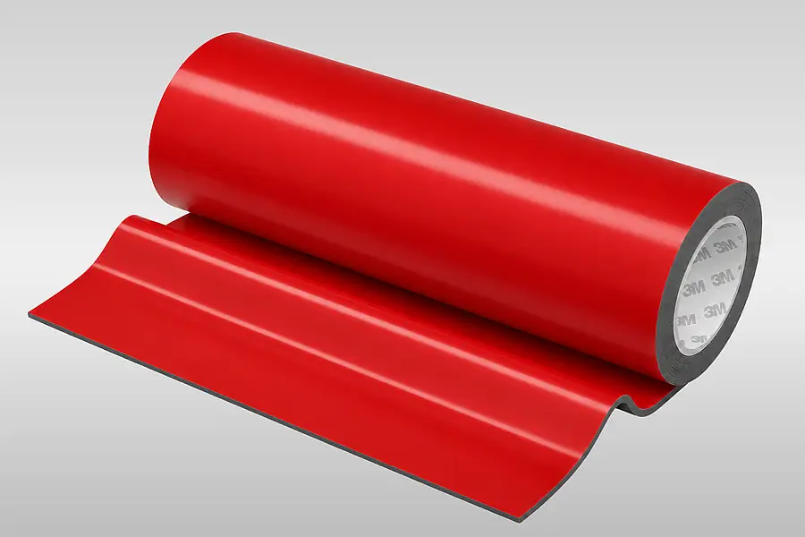 Red roll of 3M foam tape with a visible 3M core