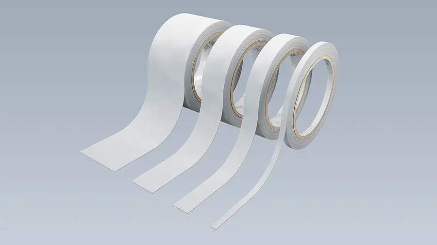 Four light-coloured adhesive tape rolls with visibly different widths