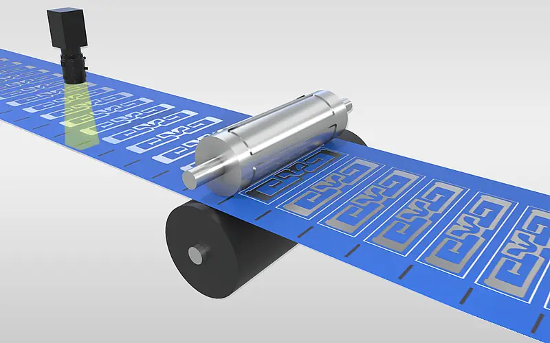Illustration of a material web with die-cut shapes