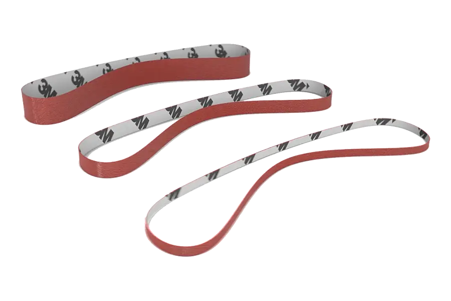 Three closed sanding belts of different lengths