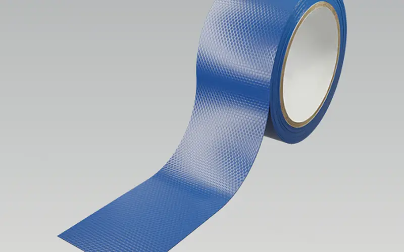 Blue adhesive tape roll as input material for processing
