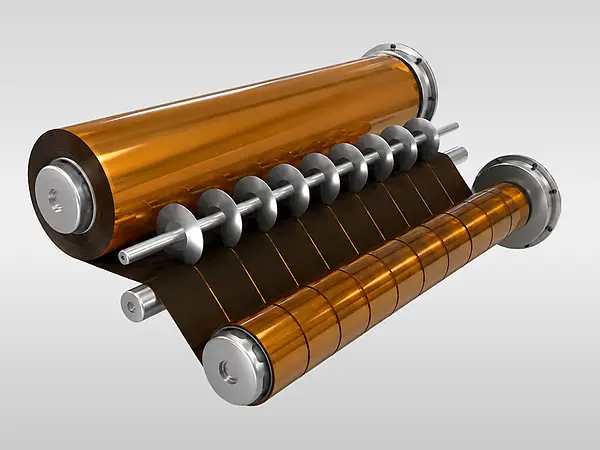 Technical film web passing through rollers and slitting blades
