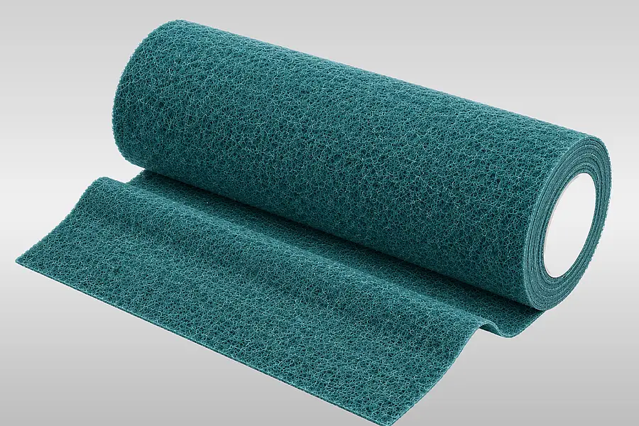 Non-woven abrasive as a convertible material