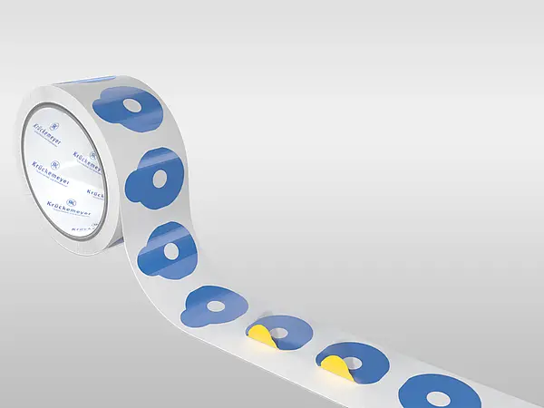 Adhesive die-cut parts with pull tabs on a roll