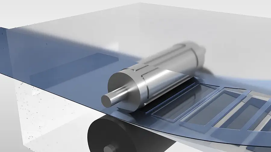 Material web runs through a transparent enclosed production area