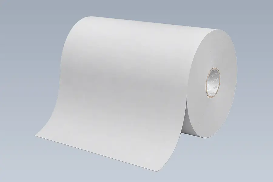 Wide white parent roll used as material for adhesive tape cutting